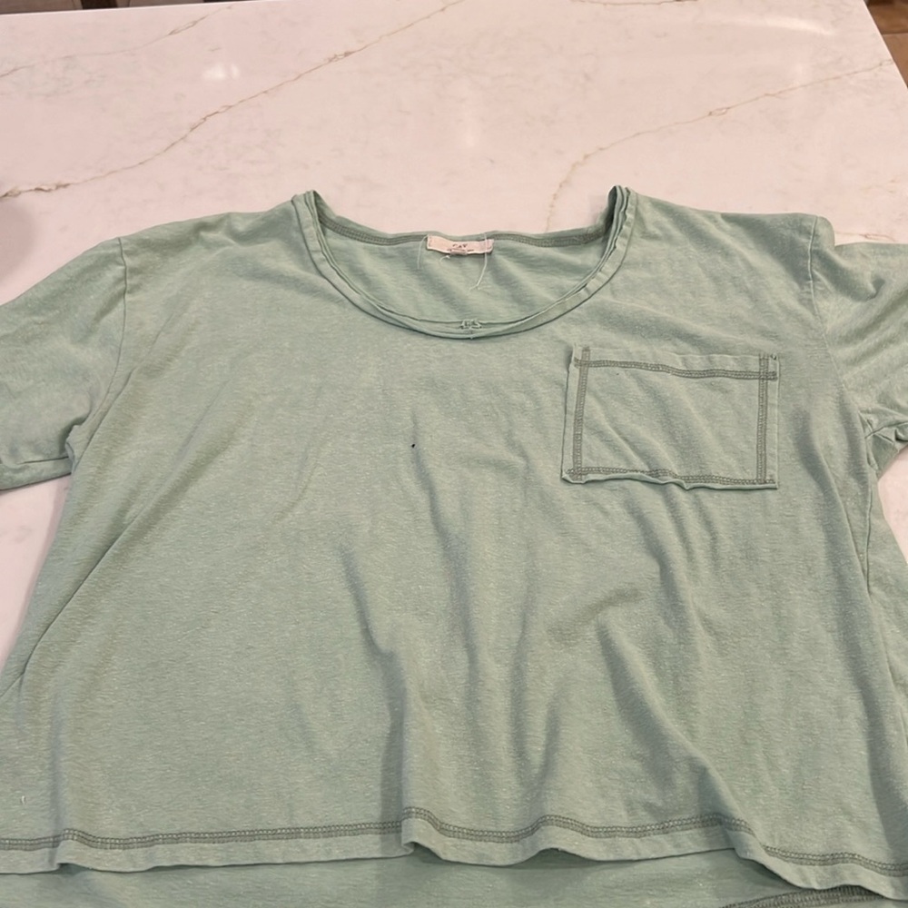 Loose, flowy green top